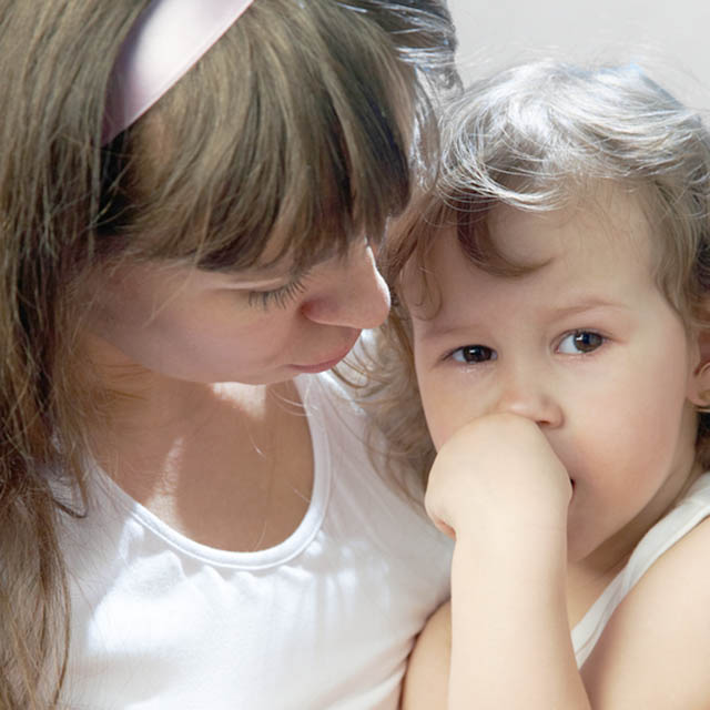 Mother comforting child