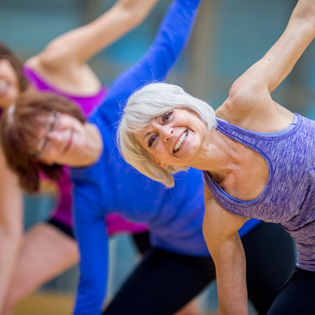 Women working out and staying healthy for fitness over 50.