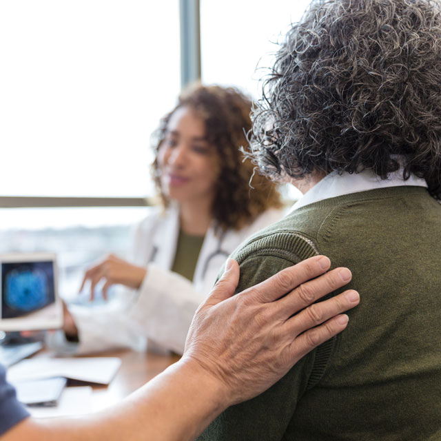 Doctor talking to patient about treatment options