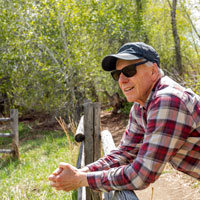 Middle-aged white man outdoors wearing shades.