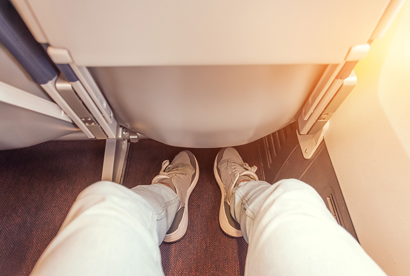 Person sitting in an airplane seat