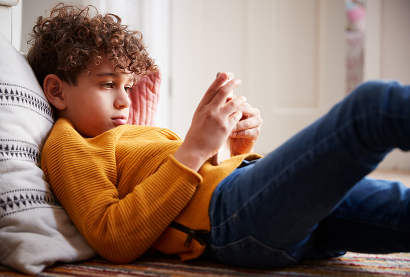 Child scrolling on a phone